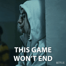a woman leaning against a wall with the words " this game won 't end " on the bottom