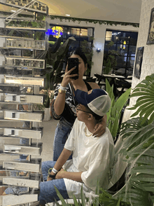 a man and a woman are taking a picture of themselves