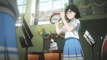 a girl with glasses is playing a tambourine