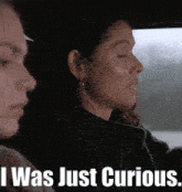 a woman in a car with the words i was just curious written below her