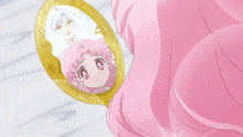 a girl with pink hair is looking in a mirror