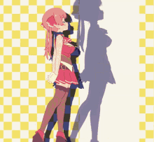 a girl in a red dress stands next to her shadow on a checkered background