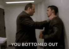 two men standing next to each other with the words " you bottomed out " written on the bottom