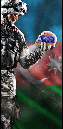 a soldier holding a skull in front of a flag