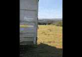 a bulford trailer is parked in a grassy area