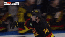 a hockey player wearing the number 74 jersey