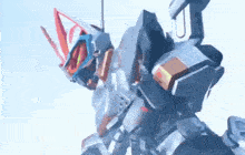 a robot is flying through the air with its arms outstretched .