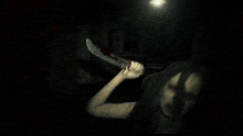 a blurry picture of a person holding a torch in their hand