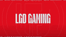 a man in a lgd gaming shirt is sitting down