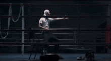 a man in a boxing ring with a bandana on his head