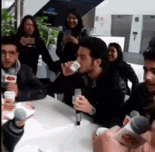 Interview Drink GIF - Interview Drink Meeting GIFs