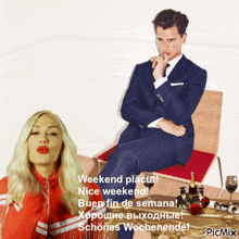 a man in a suit sits in a chair next to a woman with red lipstick