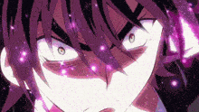 a close up of a person 's face with purple glowing eyes .