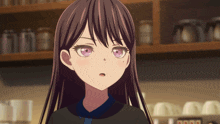 a close up of a girl 's face with a purple eye