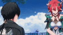 a man and a woman are standing next to each other and the woman is wearing a green dress with horns