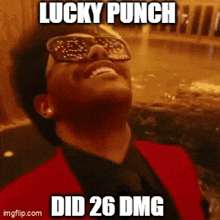 a man wearing sunglasses and a red suit with the words lucky punch did 26 dmg