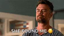 a man with a beard is saying she found me with a smiley face .