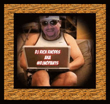 a picture of a man sitting on a couch with a laptop that says dj rich rhodes aka #dinopants