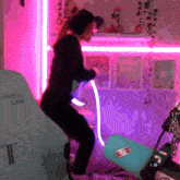 a woman dancing in front of a chair that says secret lab on it