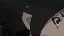 a close up of a person 's face in a cartoon with a dark background .