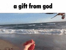 a picture of a beach with the words a gift from god on the bottom
