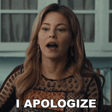 a woman says " i apologize " in front of her face