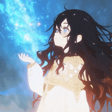 a girl with long black hair and blue eyes is looking up at the stars