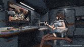 a woman sits in front of a computer monitor that says game over