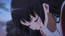 a close up of a girl 's face with her eyes closed and her mouth open