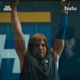 a man in a crop top is on hulu