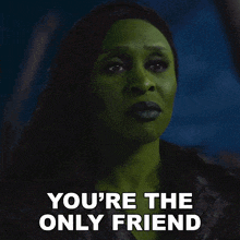 a woman with green paint on her face is saying " you 're the only friend "