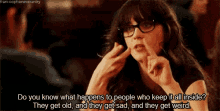 a woman wearing glasses is talking about people who keep it all inside