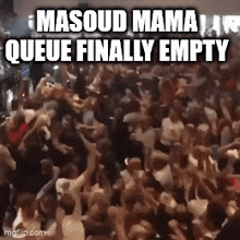 a crowd of people are gathered in a room with the words masood mama queue finally empty above them .