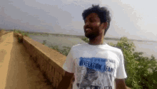 Guy With Printed Shirt Walking GIF - Guy With Printed Shirt Walking Hand Gesture GIFs