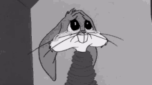 a black and white drawing of bugs bunny with a sad look on his face