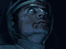 a close up of a person 's face with a bandage on it
