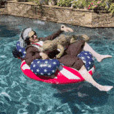 a man in an uncle sam costume is floating on an american flag raft in a pool