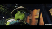 a cartoon character with a green face and a hat is sitting in a car .