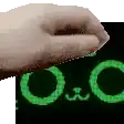 a close up of a person 's hand holding a green sign that says o & c