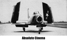 a black and white photo of an airplane with the words absolute cinema underneath it