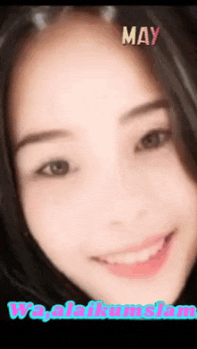 a close up of a woman 's face with the words may on the top
