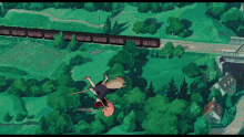 an aerial view of a witch flying over a lush green forest