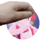 a hand is holding a cd with a picture of a girl on it