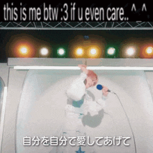 a person singing into a microphone with the words this is me btw 3 if u even care above them