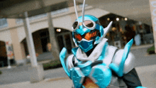 a person in a costume with a helmet and goggles on