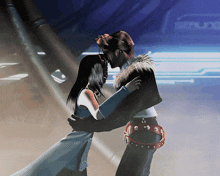 a man and a woman are hugging in front of a sign that says scene