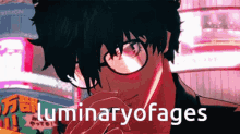 a man with glasses covering his face with his hand and the words luminaryofages below him