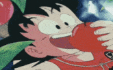 a cartoon character eating a red apple with the letter t on his chest