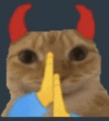 a cat with devil horns is holding a yellow object in front of its face .