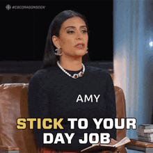 a woman with the name amy on her shirt